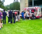 Summer fete, nice sunny day customers waiting for their ice cream